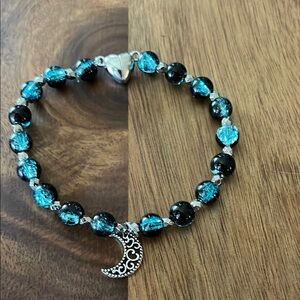 Elegant Blue and Black Beaded Bracelet with Moon Charm Jewelry